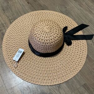 Elegant Tan Sun Hat with Black Ribbon